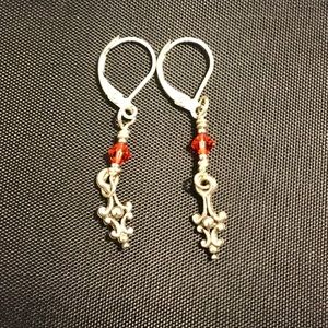 dangle earrings with unique charm and pink crystal